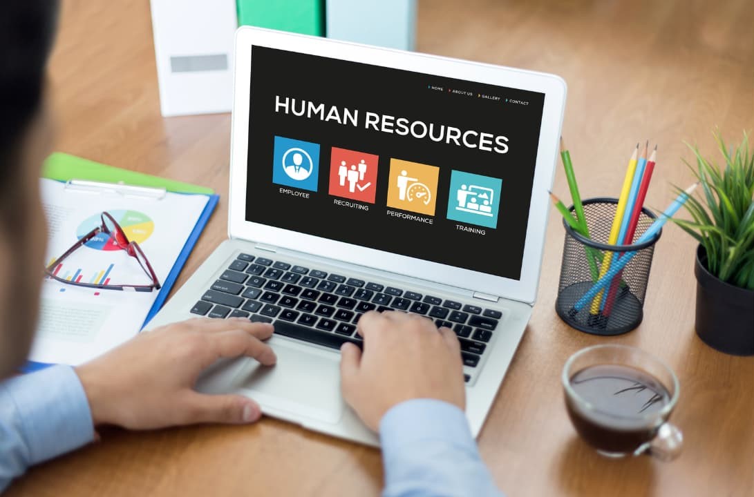 A laptop screen showing a human resources online system