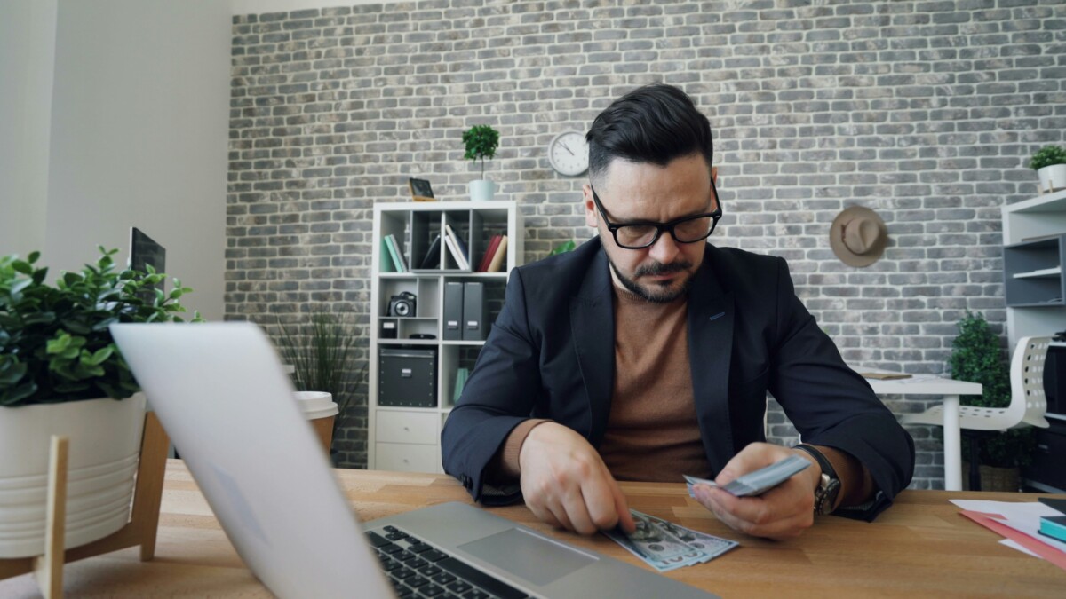 business man counting money